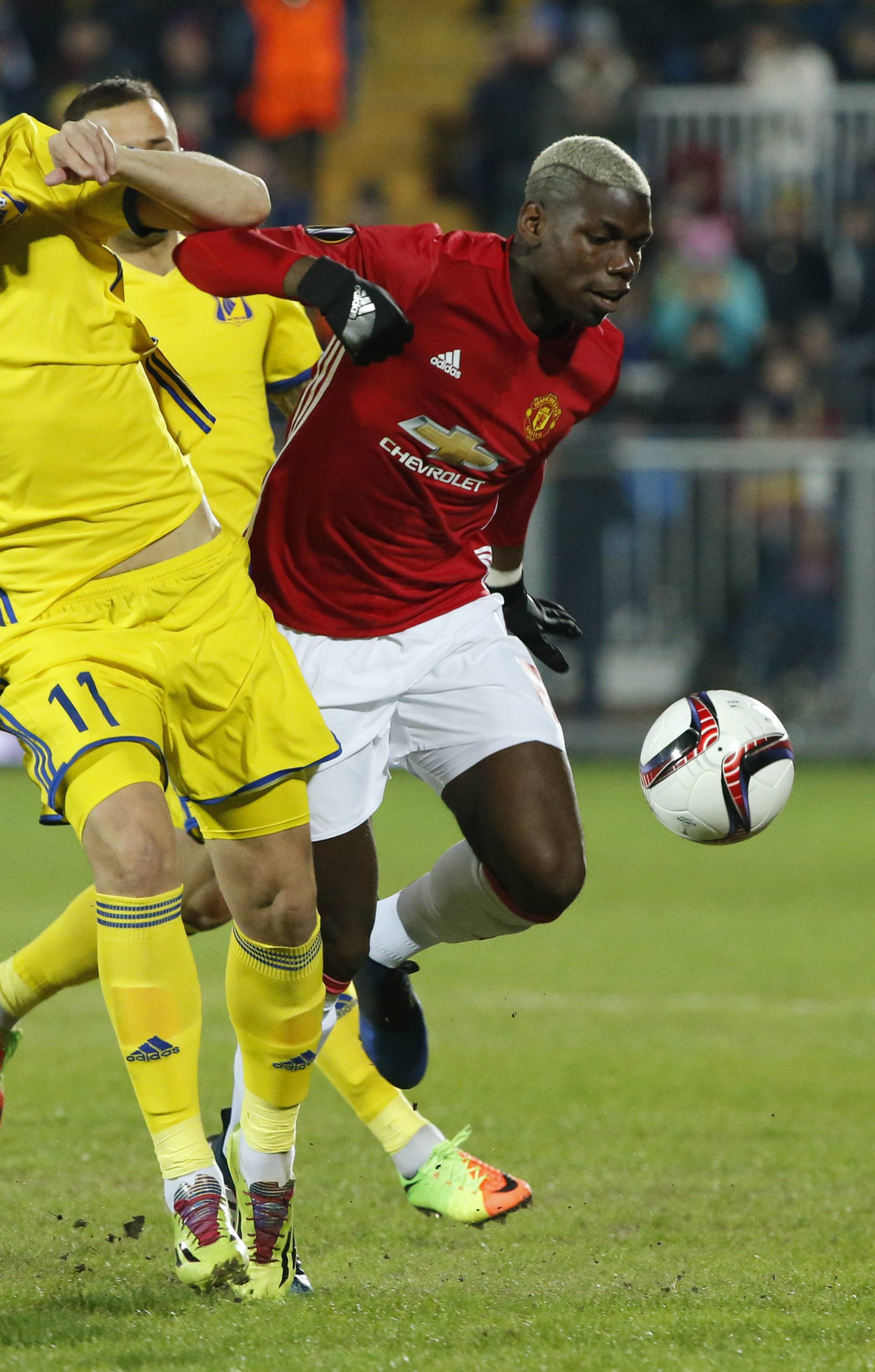 Manchester United's Paul Pogba in action with FC Rostov's Aleksandr Bukharov