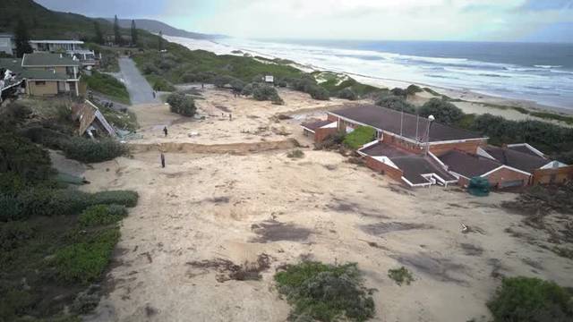 Drone footage shows destroyed coastal buildings following torrential rains in South Africa