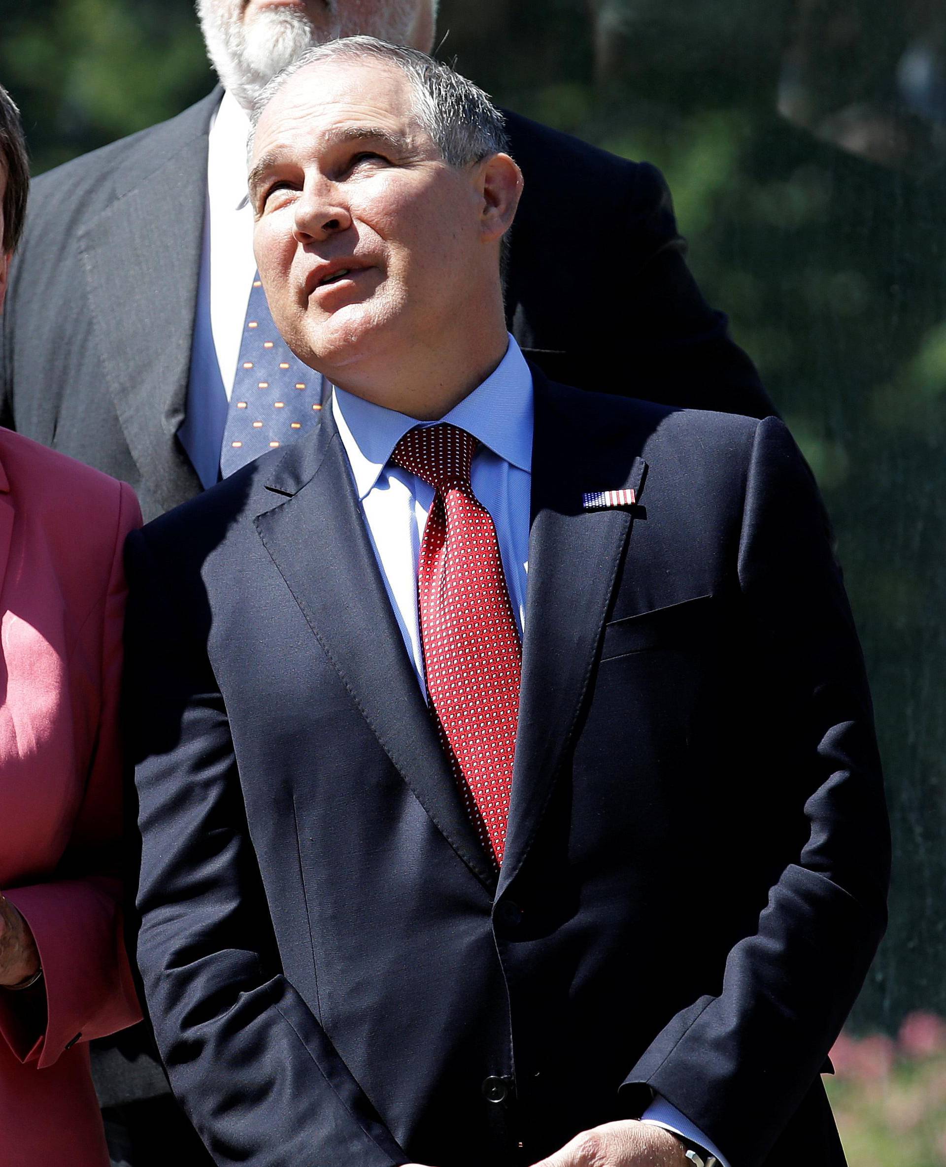 Environmental Protection Agency (EPA) Administrator Scott Pruitt looks on next to German Environment Minister Barbara Hendricks during a summit of  Environment ministers from the G7 group of industrialised nations in Bologna