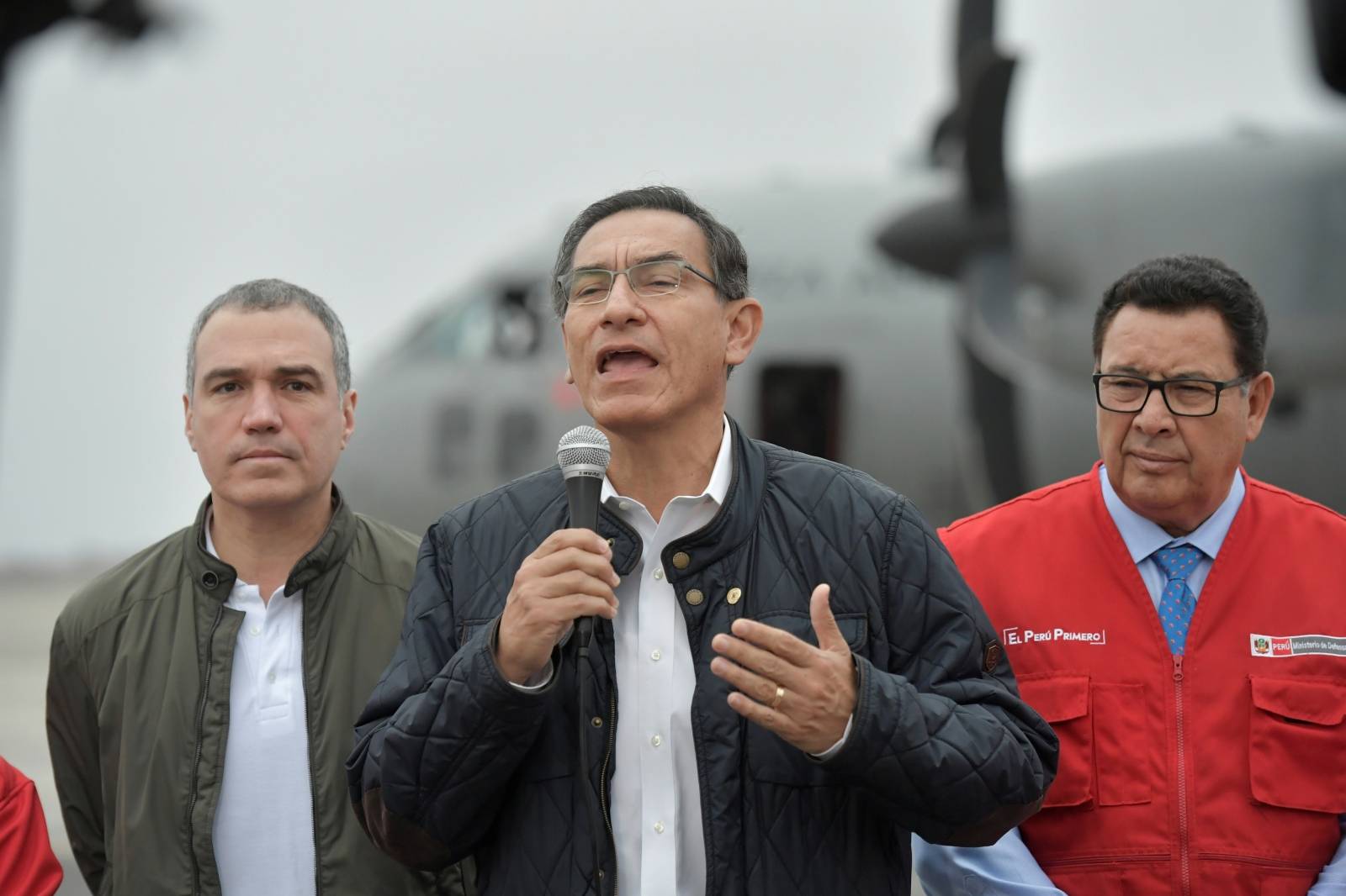 Peru's President Martin Vizcarra accompanied by members of his cabinet speaks to the media before leaving for the area affected by earthquake, at the Jorge Chavez airport in Lima