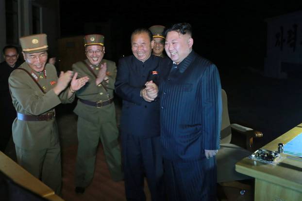 North Korean leader Kim Jong Un guides the second test-fire of intercontinental ballistic missile (ICBM) Hwasong-14
