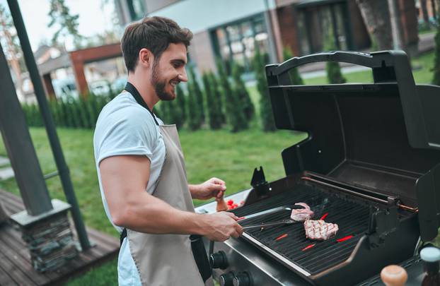 Handsome,Bearded,Man,Is,Making,Grill,Barbecue,Outdoors,On,The