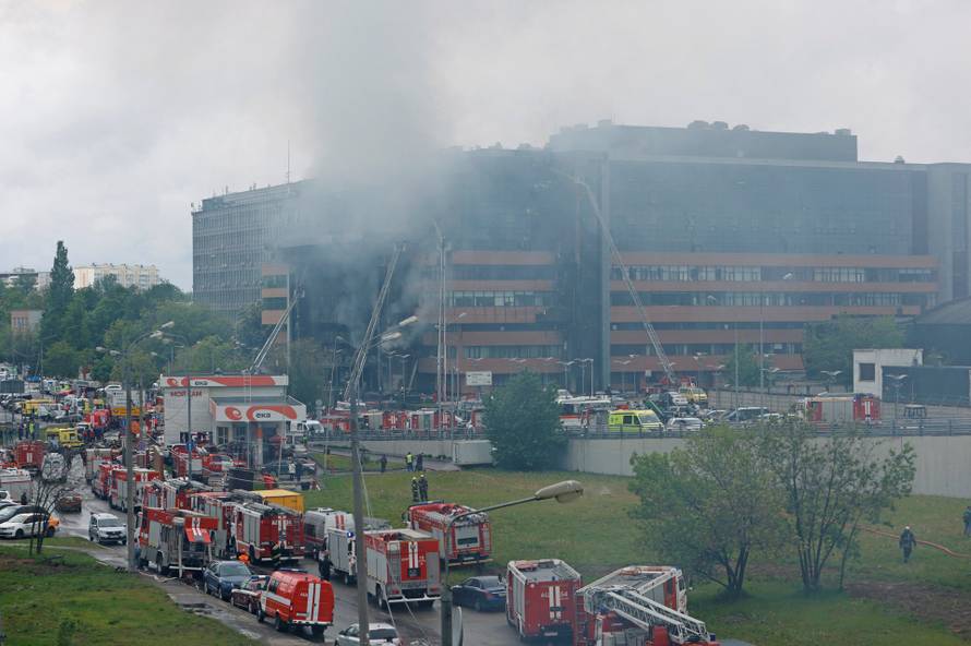 Firefighters extinguish a fire at a business centre in Moscow
