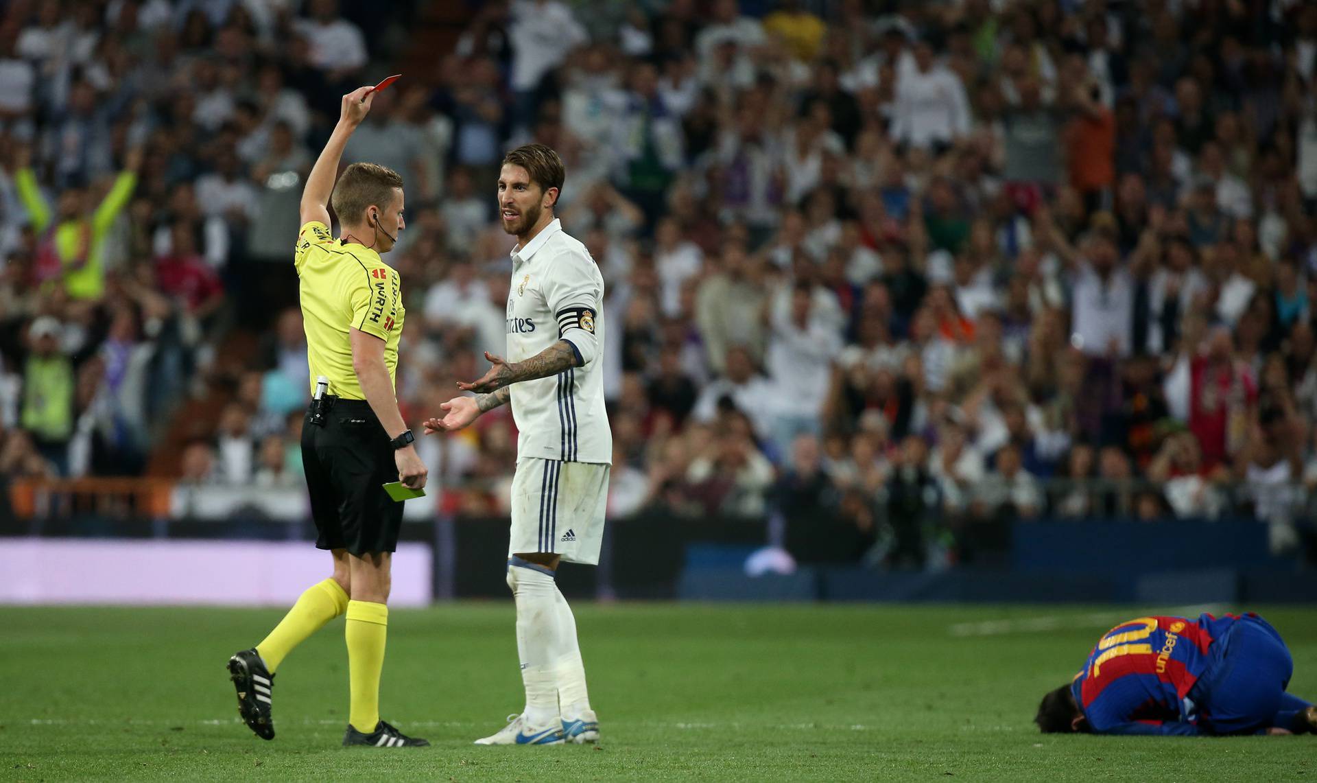 Real Madrid's Sergio Ramos is shown a red card by referee Alejandro Hernandez