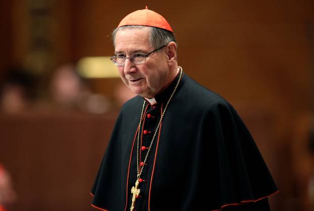 FILE PHOTO: Cardinal Mahony of the U.S. arrives for a prayer at Saint Peter's Basilica in the Vatican