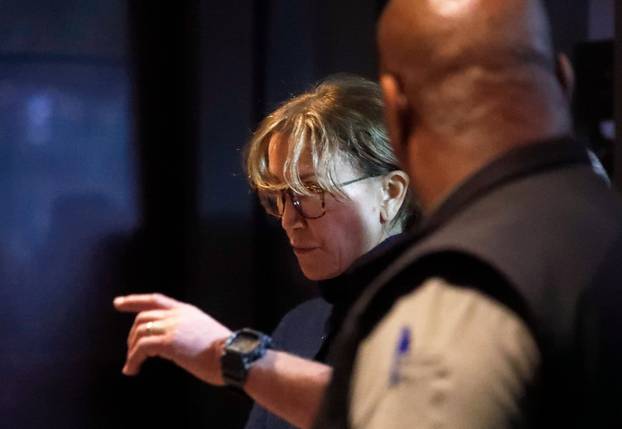 Actor Felicity Huffman departs an initial hearing for defendants in a racketeering case involving the allegedly fraudulent admission of children to elite universities, at the U.S. federal courthouse in downtown Los Angeles