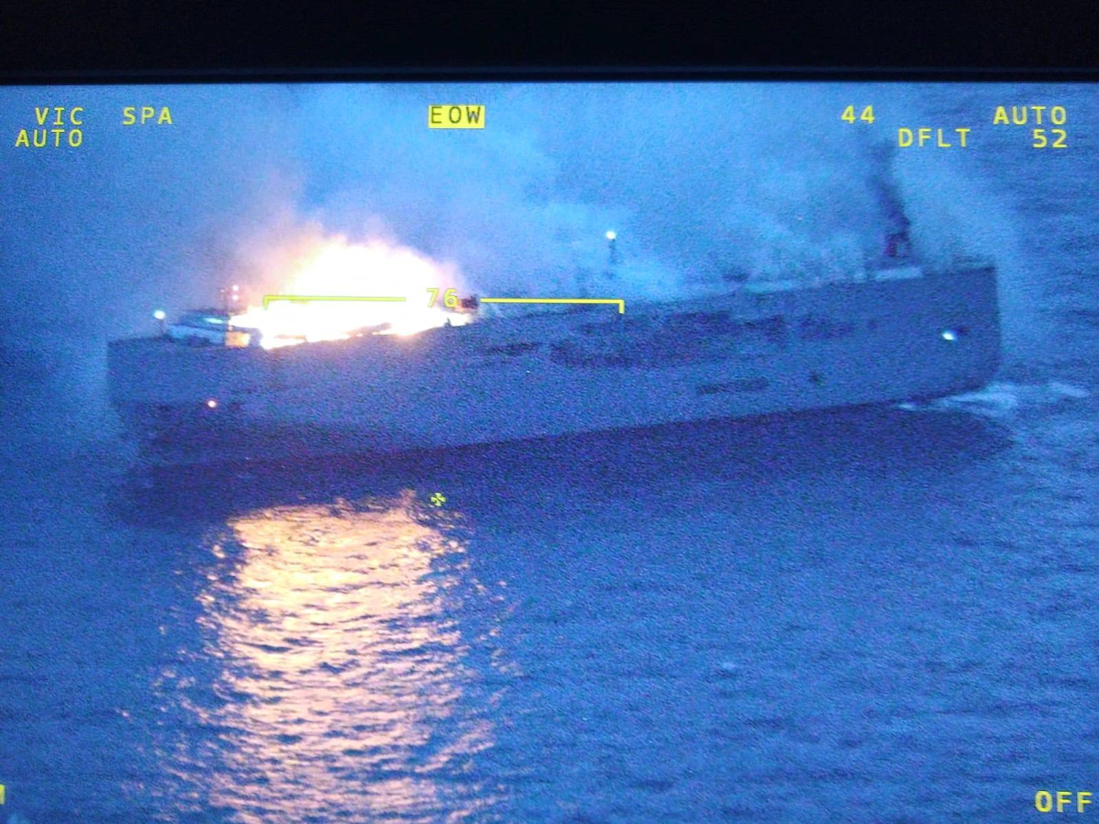 Smoke rises as a fire broke out on the cargo ship Fremantle Highway, at sea