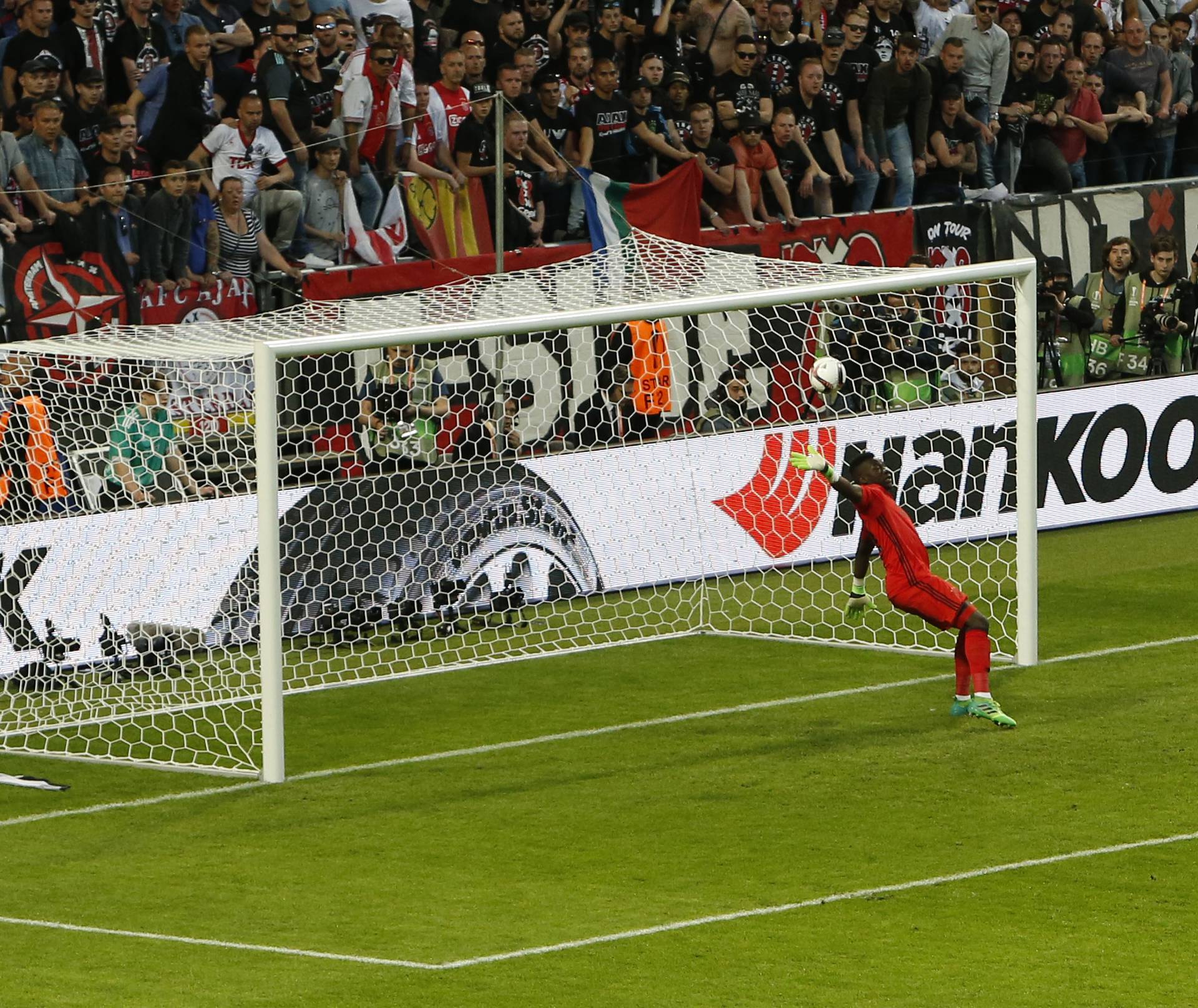 Ball deflected past Ajax's Andre Onana as Manchester United's Paul Pogba scores their first goal
