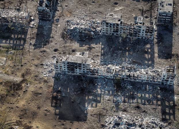 A drone view shows destroyed buildings in the frontline town of Chasiv Yar