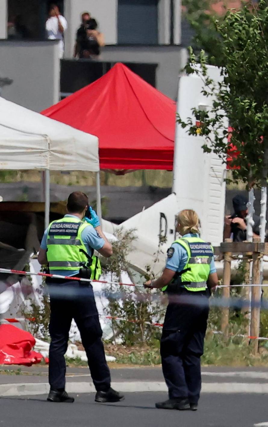 French rescuers work at the site of a plane crash, in Tomblaine