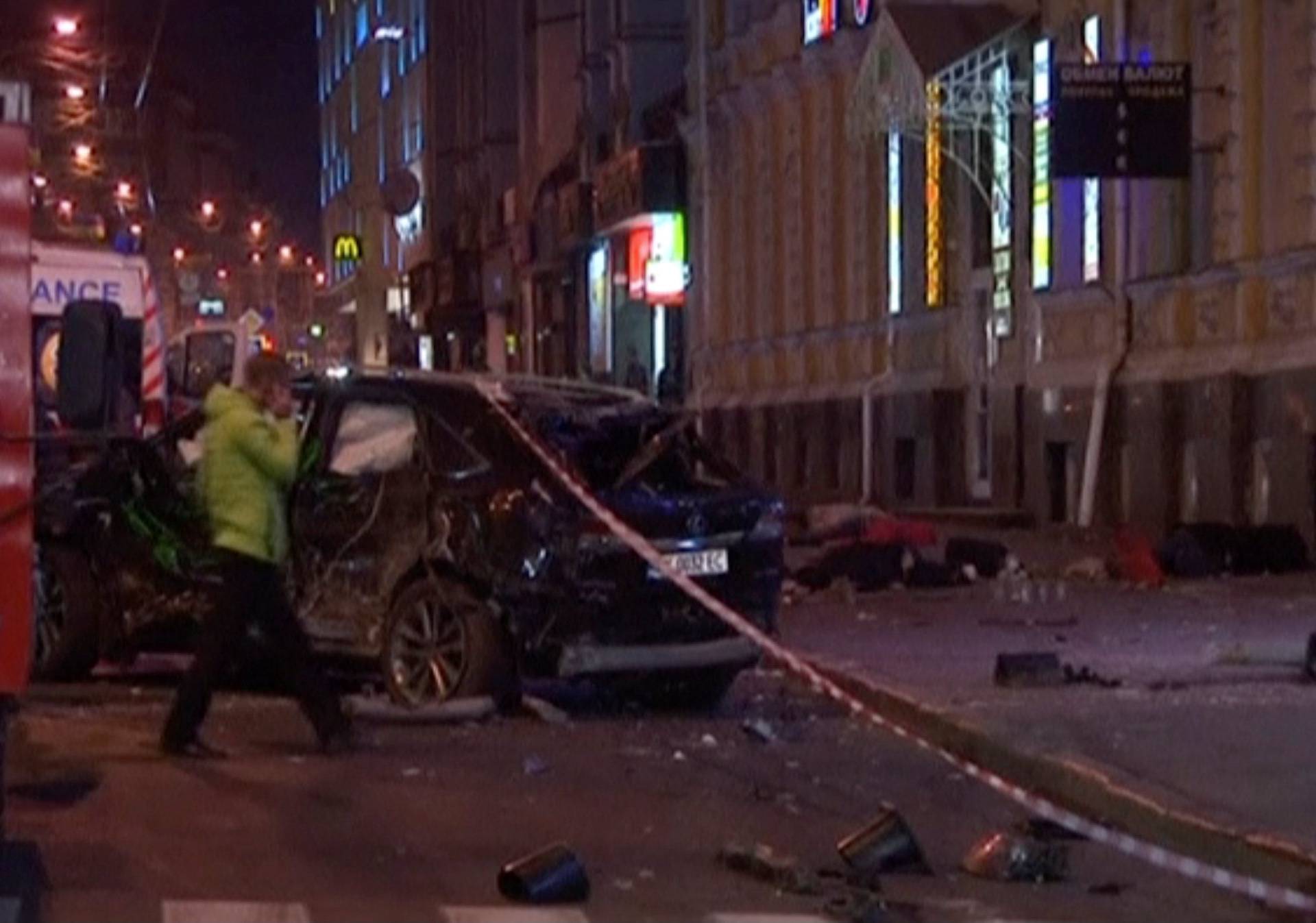 A still image taken from a video shot on October 18, 2017, shows a damaged sport utility vehicle at the accident scene after a car drove into pedestrians following a vehicle collision in central Kharkiv