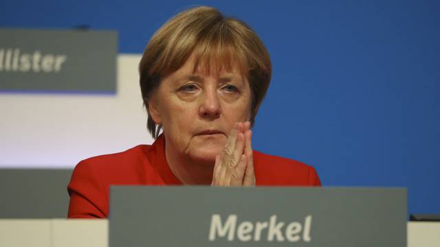 German Chancellor and leader of the conservative CDU Merkel is pictured at the CDU party convention in Essen