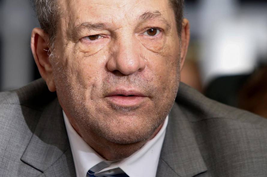 FILE PHOTO - Film producer Weinstein exits at New York Criminal Courtroom for his sexual assault trial in the Manhattan borough of New York City, New York
