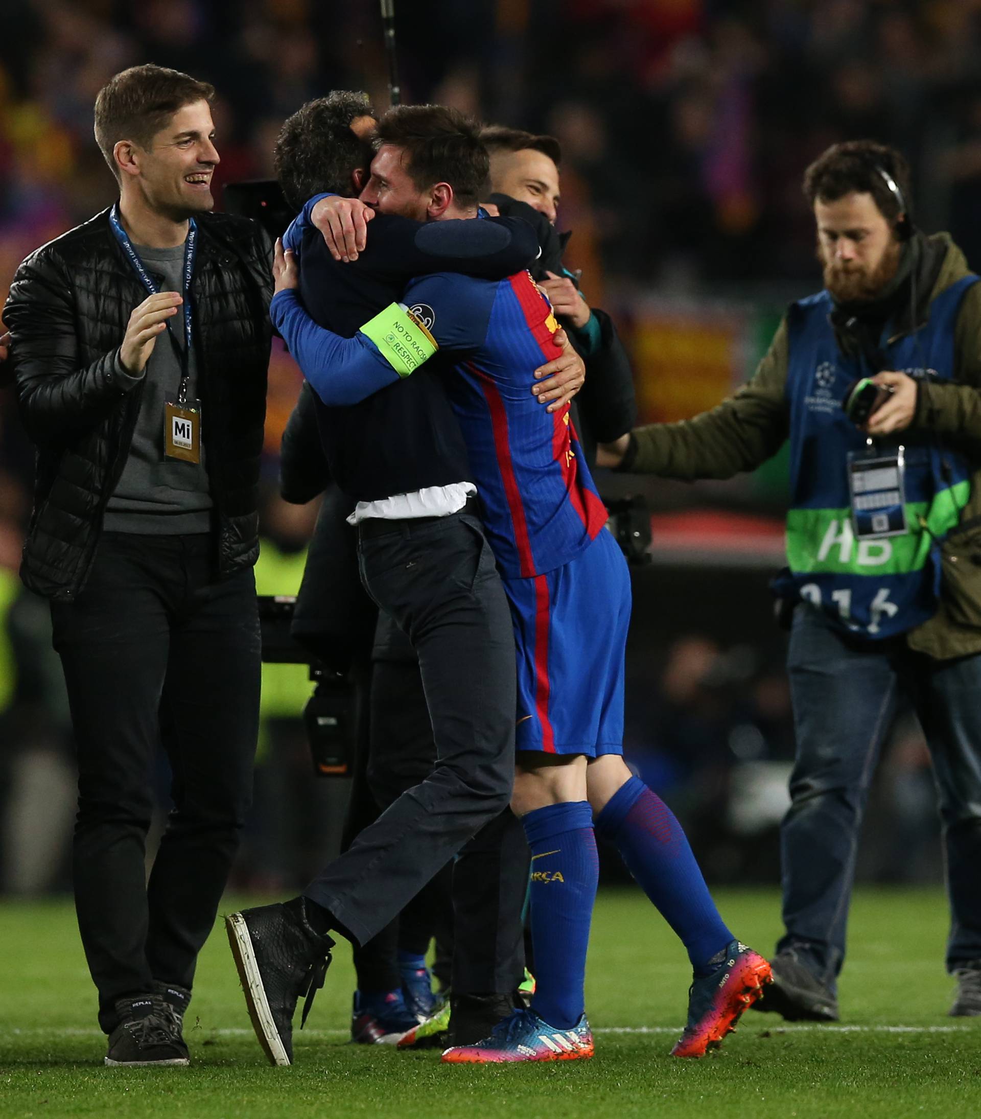 Barcelona coach Luis Enrique and Lionel Messi celebrate after the game