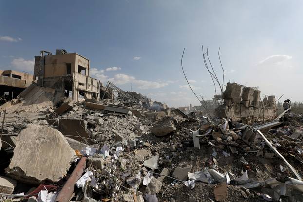 The destroyed Scientific Research Centre is seen in Damascus