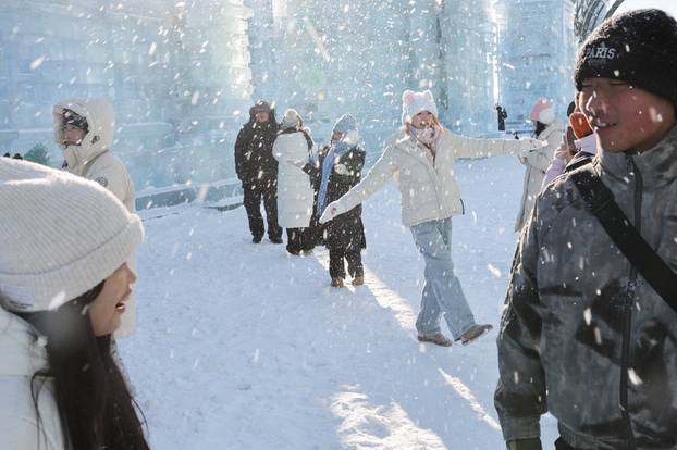 People visit the annual Ice and Snow Festival in Harbin