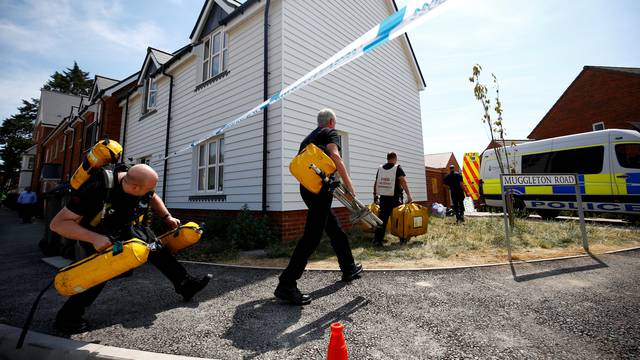 FILE PHOTO: Fire and Rescue Service personel arrive with safety equipment at the site of a housing estate on Muggleton Road, after it was confirmed that two people had been poisoned with the nerve-agent Novichok, in Amesbury