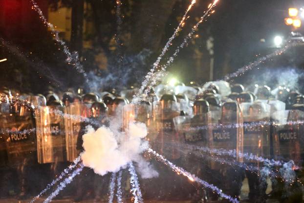 Georgian opposition supporters protest against government's EU application delay, in Tbilisi