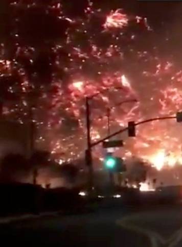 Flames of a wildfire in 405 highway in Los Angeles