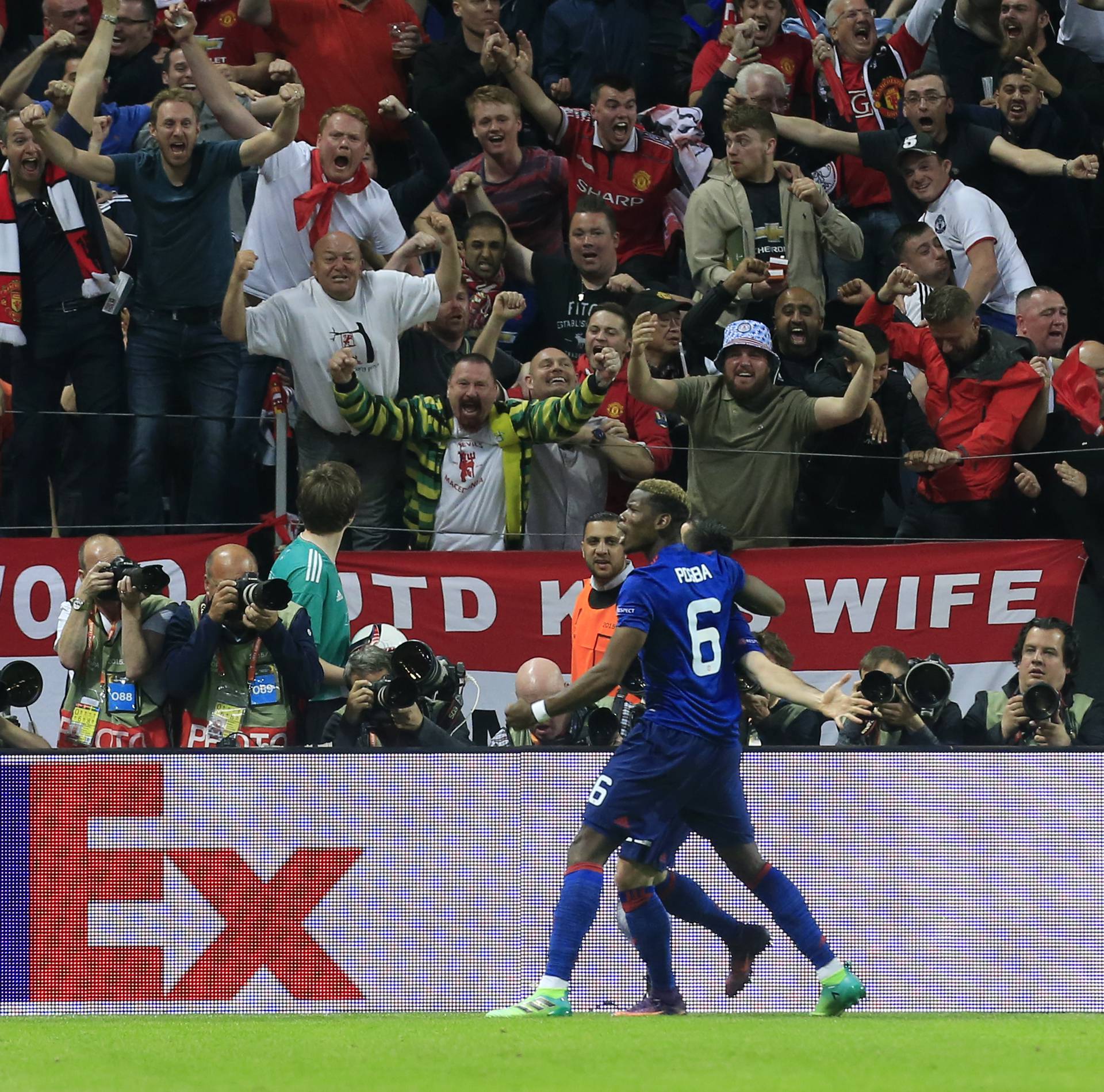 Manchester United's Henrikh Mkhitaryan celebrates scoring their second goal with team mates