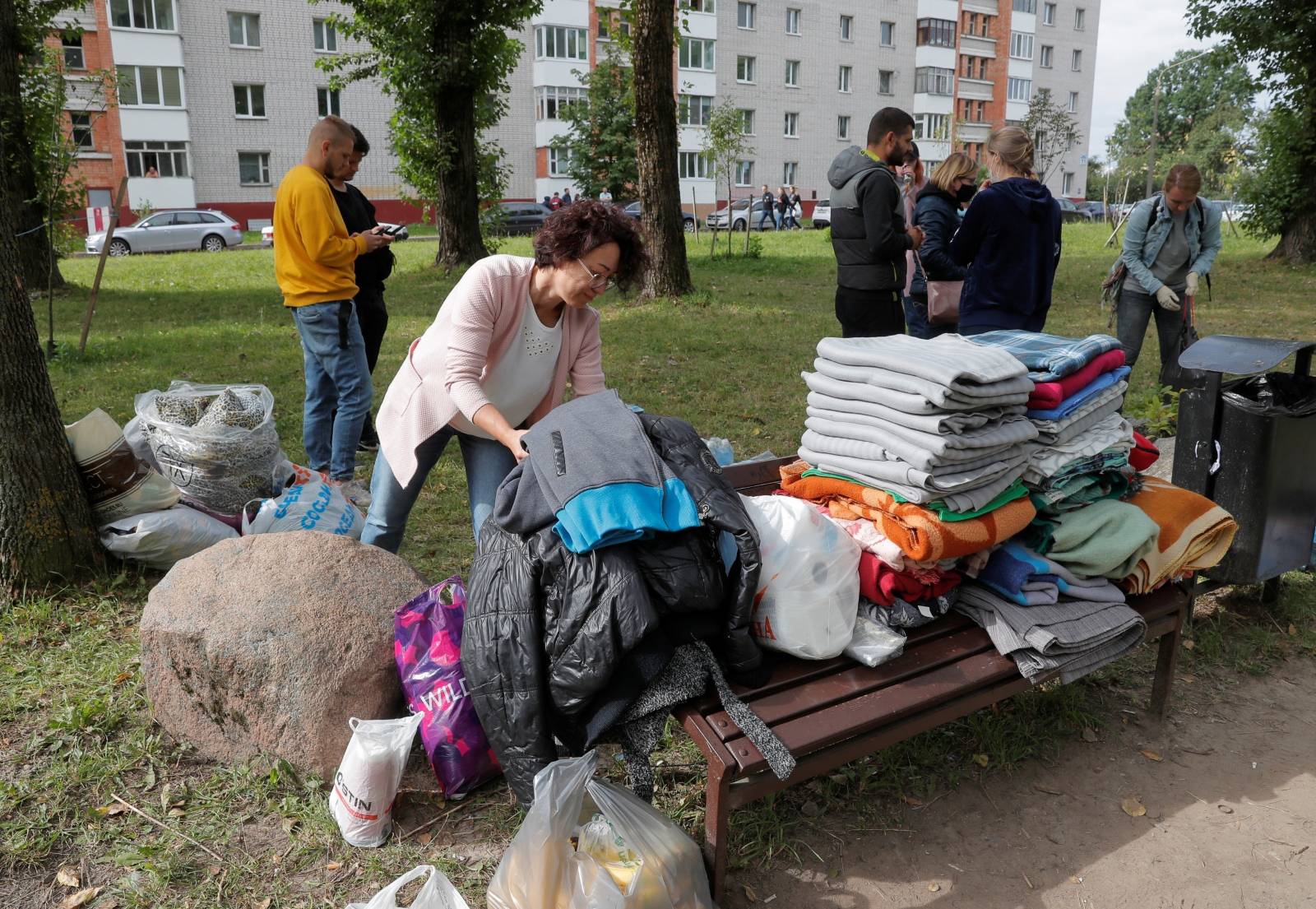 People gather outside a detention centre following recent protests against the presidential election results in Minsk