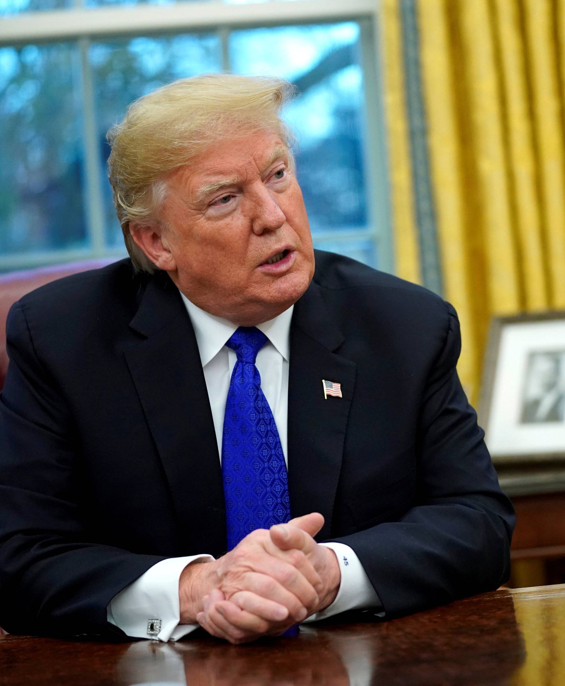 FILE PHOTO: U.S. President Donald Trump sits for interview with Reuters at the White House in Washington