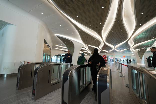 Passengers arrive at the King Abdullah Financial District Metro Station in Riyadh
