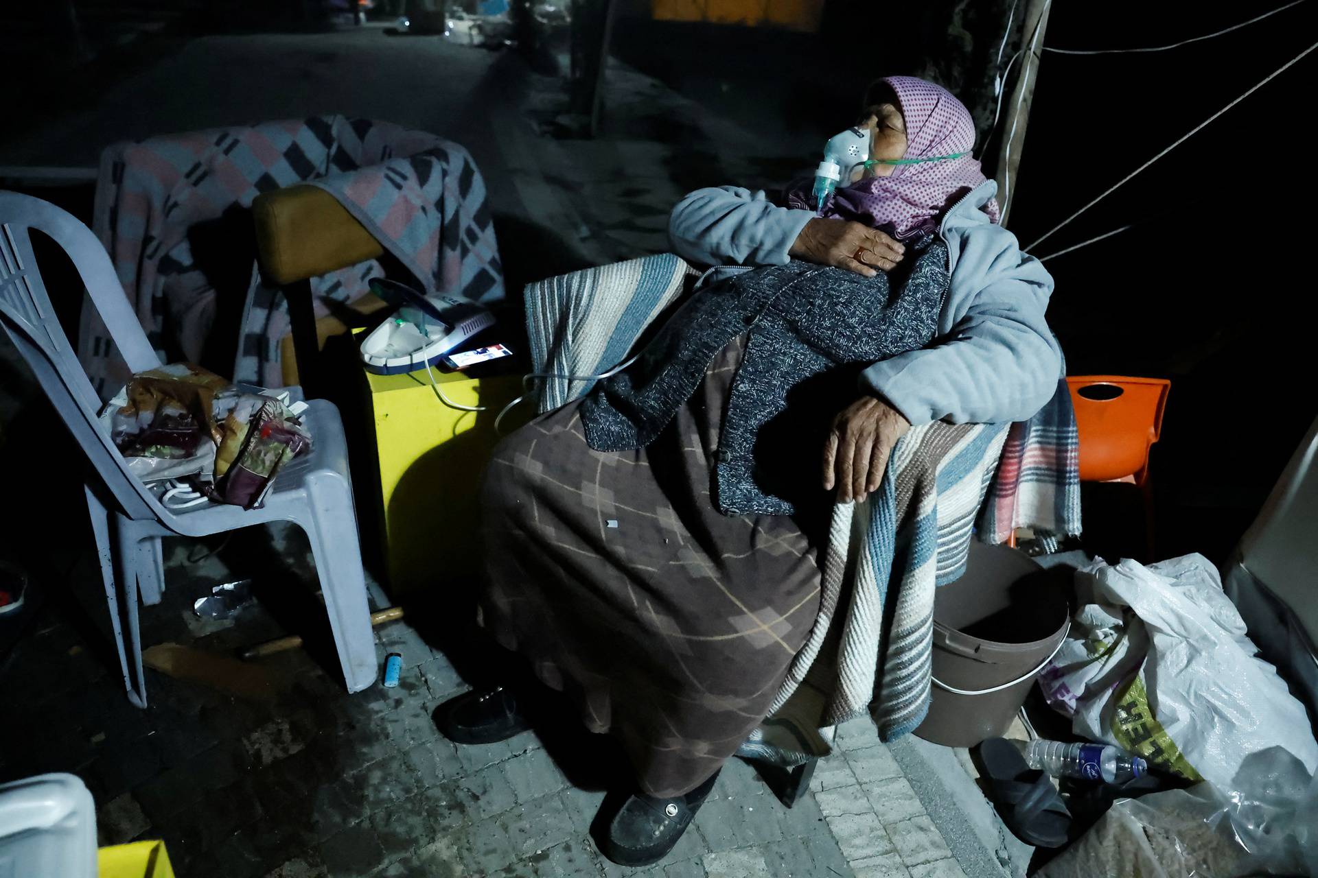 People react after a quake in Antakya in Hatay province, Turkey