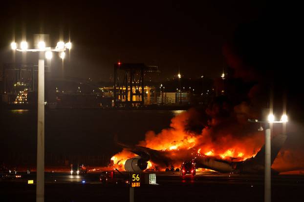 Japan Airlines' A350 airplane on fire at Haneda international airport in Tokyo