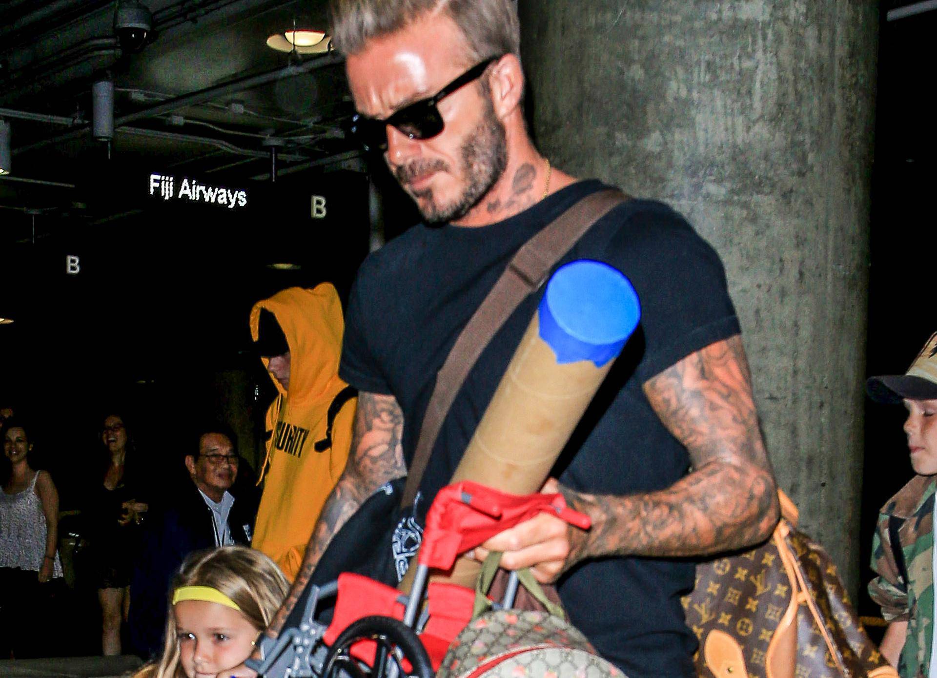 David & Victoria Beckham Catch a Flight Out of LAX With Their Kids