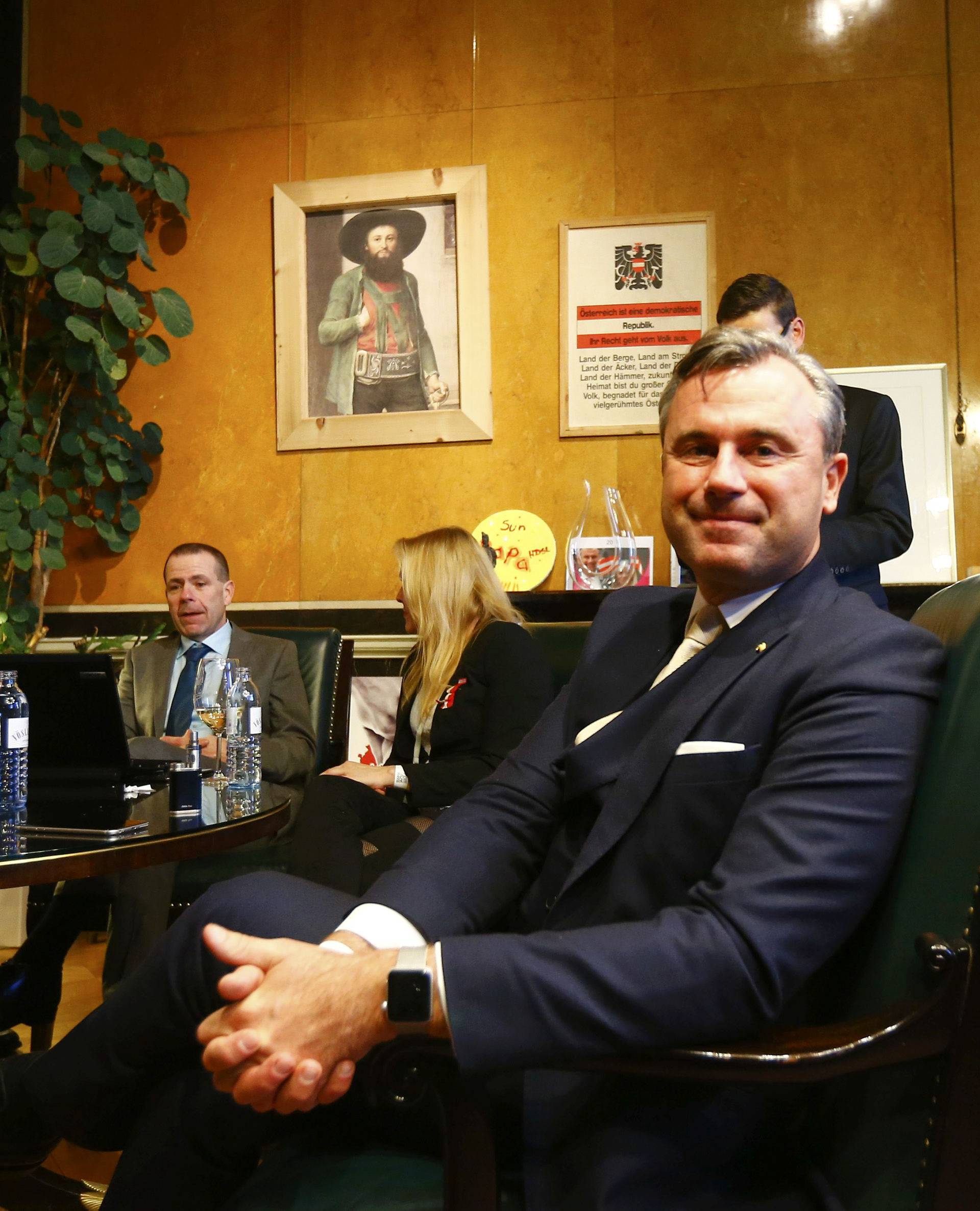 Austrian far-right Freedom Party (FPOe) presidential candidate Hofer and his wife wait for the first projections in his office in Vienna