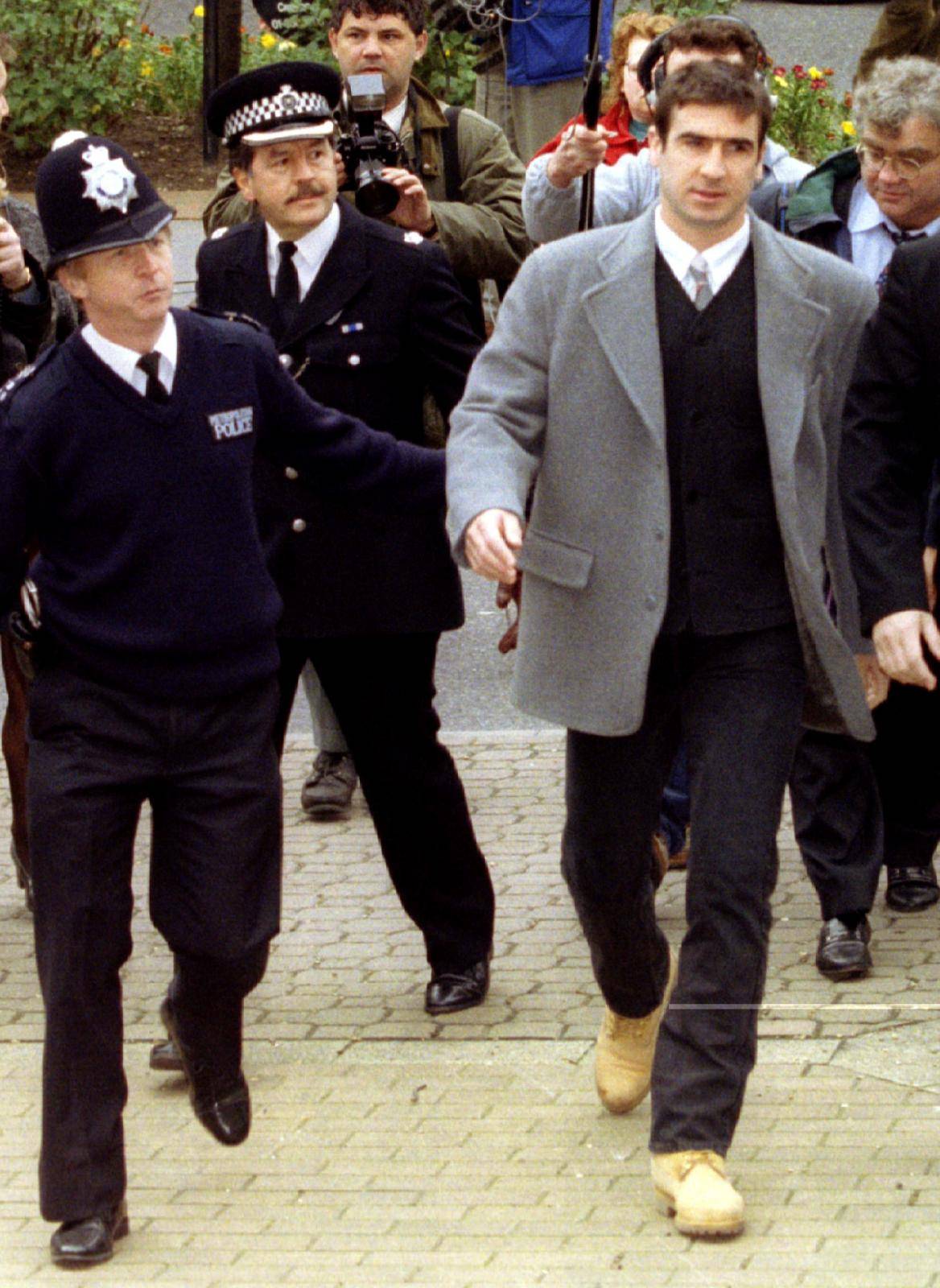 FILE PHOTO: Manchester United's Eric Cantona arrives at Croydon Crown Court to appeal against his two-week jail sentence for a 'kung-fu' kick on a Crystal Palace fan who had shouted abuse at him when the Frenchman was sent off in a league match in January