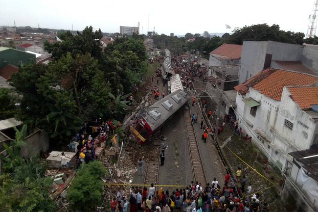 An aerial picture of a derailed commuter train in Bogor, West Java province