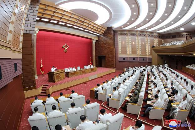 North Korean leader Kim Jong Un addresses a plenary meeting of the Central Committee of the Workers