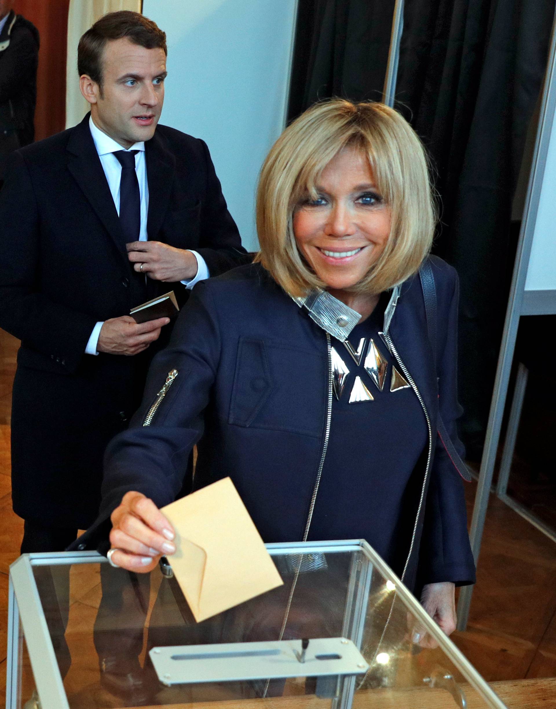 Brigitte Trogneux, the wife of French presidential election candidate Emmanuel Macron casts her ballot during the the second round of 2017 French presidential election, in Le Touquet