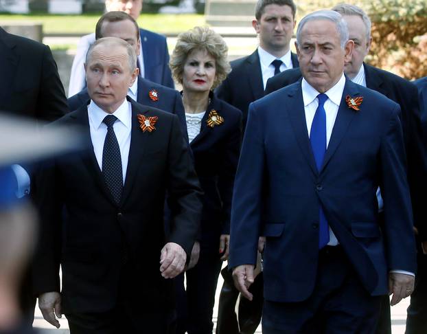 Russian President Putin and Israeli PM Netanyahu arrive to watch the Victory Day parade at Red Square in Moscow