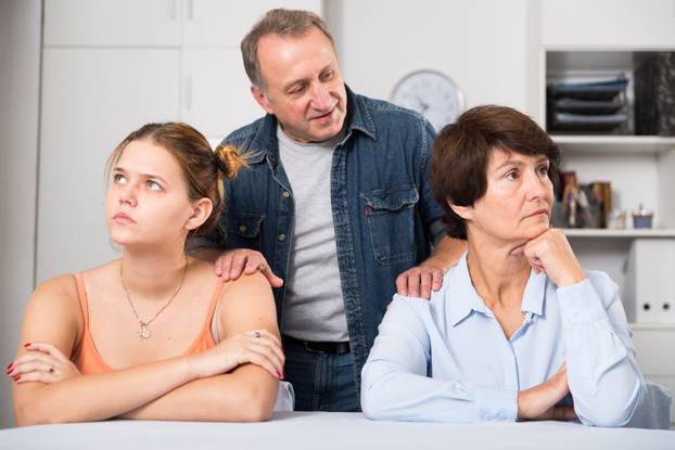 Father is reconciling his wife with adult daughter