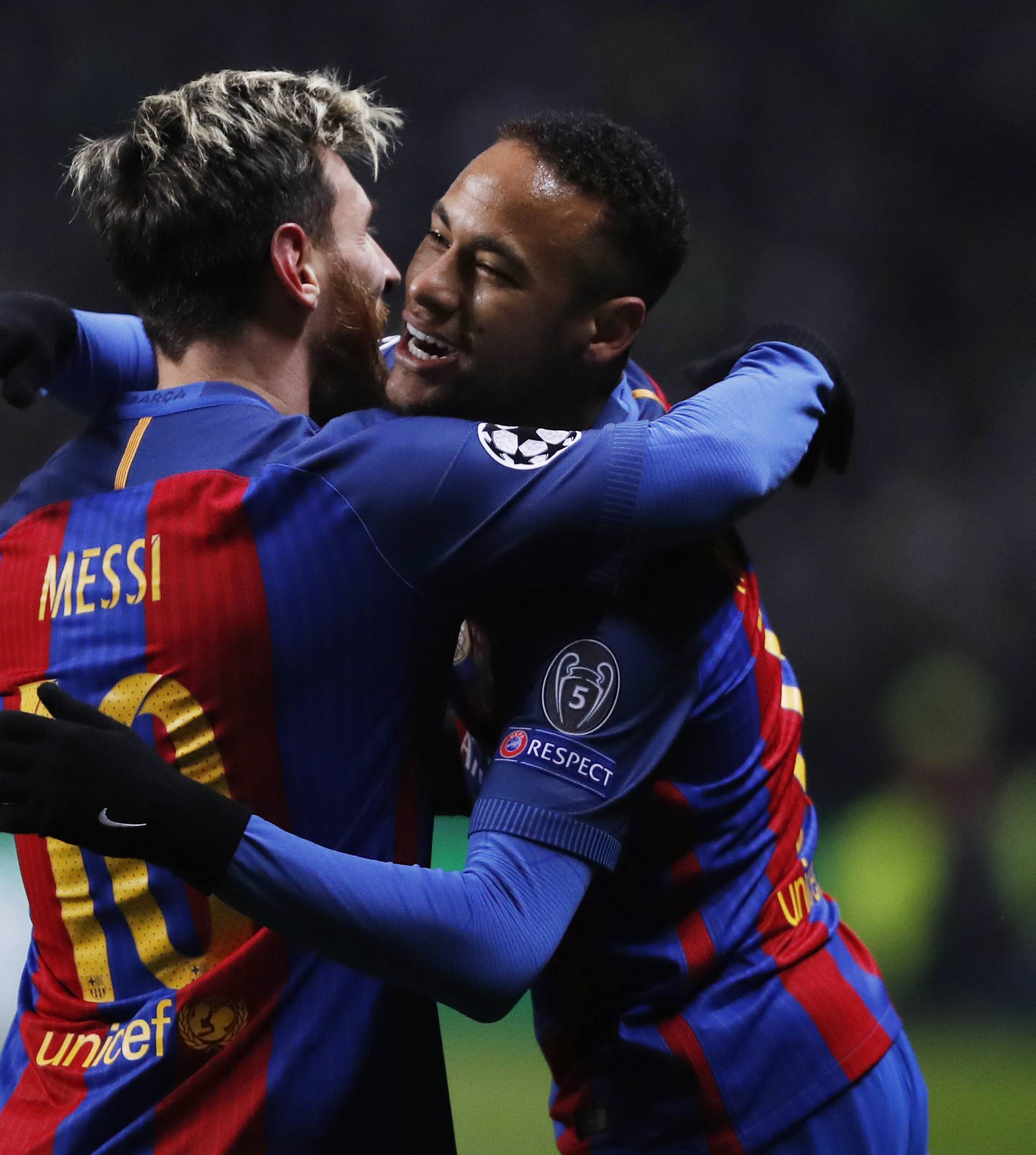 Barcelona's Lionel Messi celebrates scoring their first goal with Neymar