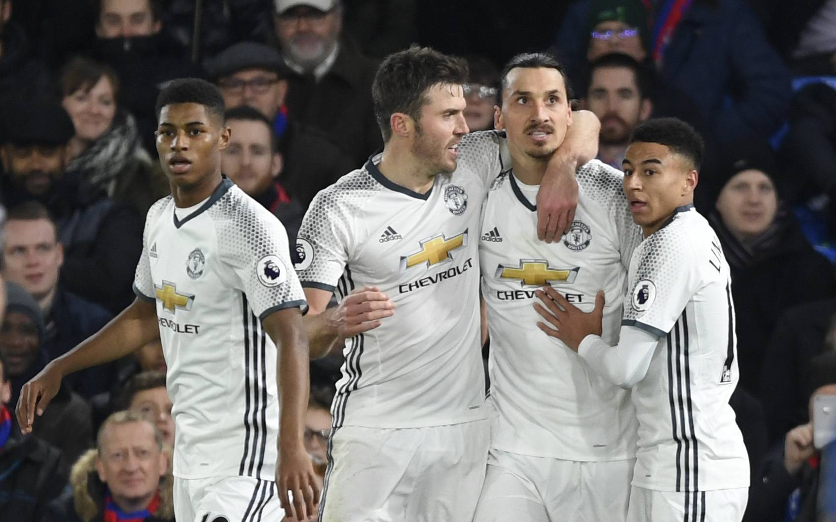 Manchester United's Zlatan Ibrahimovic celebrates scoring their second goal with teammates