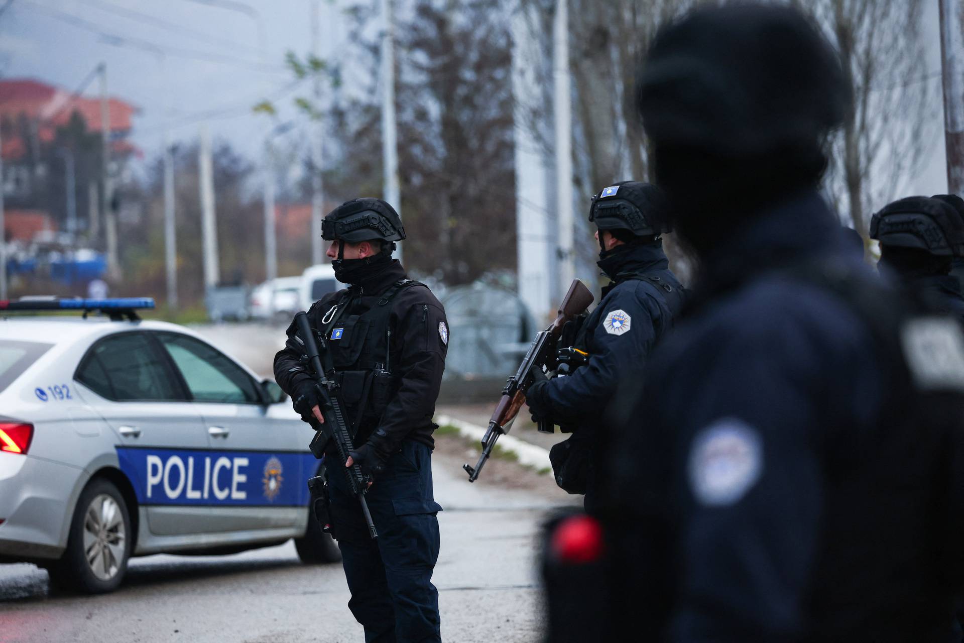 Kosovo police officers patrol an area in the northern part of the ethnically-divided town of Mitrovica