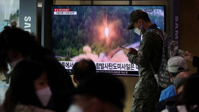 FILE PHOTO: North Korea fires a ballistic missile towards the sea off its east coast