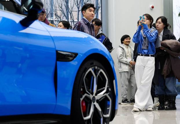 Chinese tech giant Xiaomi unveils new generation of SU7 electric vehicle, in Beijing