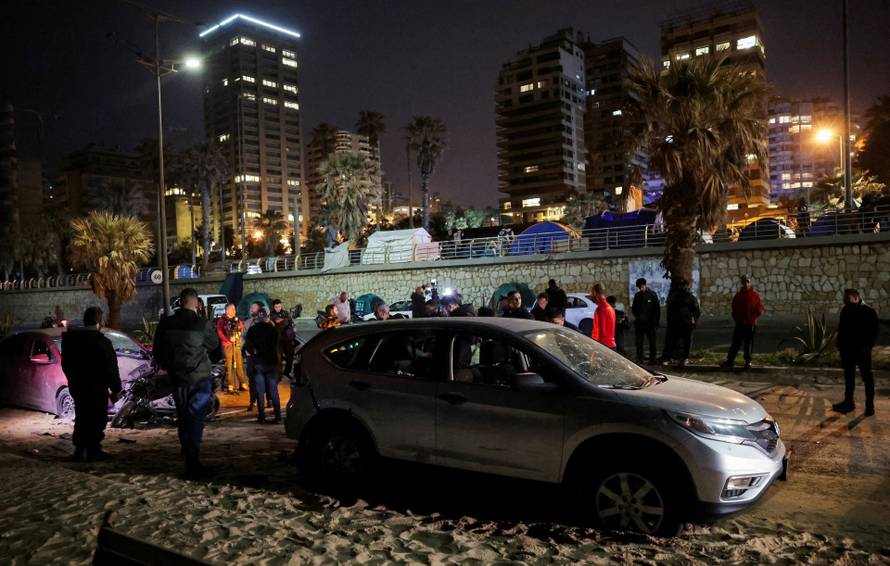 Aftermath of a drone strike targeting a car in Ramlet al-Baida at Corniche Beirut, following an escalation between Hezbollah and Israel amid the U.S.-Israeli conflict with Iran