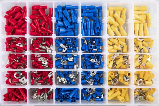 Yellow,,Blue,And,Red,Electric,Terminal,Connectors,Organized,In,Plastic