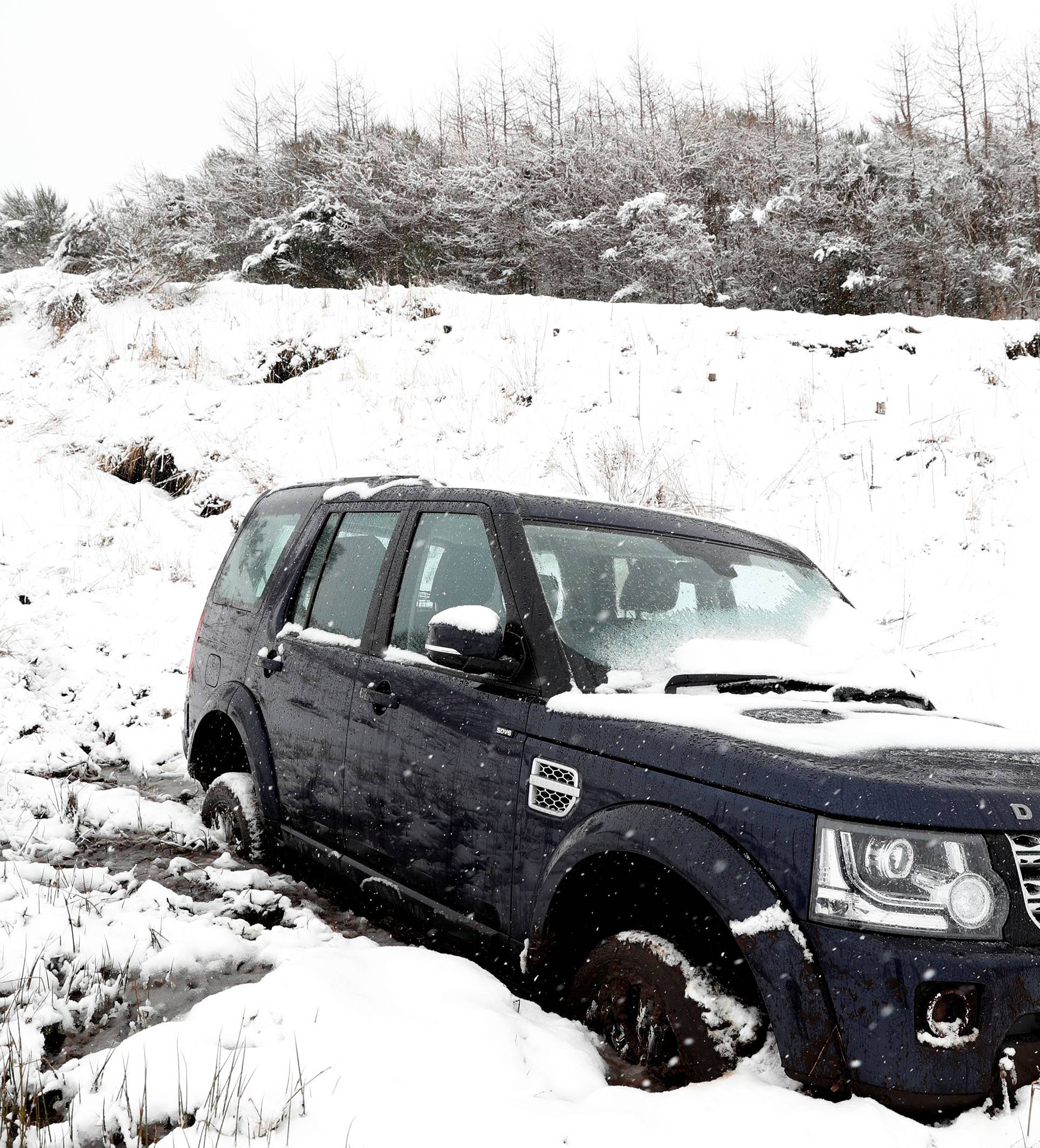 A vehicle is seen in a field after it left the road, next to A924 near Kinnaird