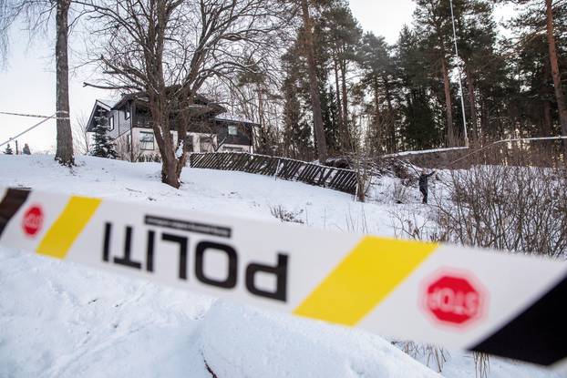 Police work outside the house of Norwegian Anne-Elisabeth Falkevik Hagen, who is the wife of real estate investor Tom Hagen, and has been kidnapped according to local media, in Fjellhamar