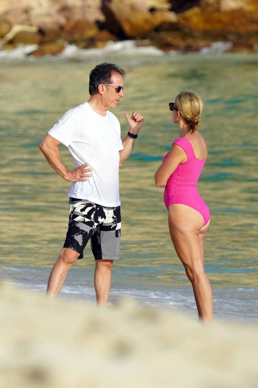 PREMIUM EXCLUSIVE: Jerry Seinfeld, 68, and his wife Jessica, 51, are seen taking a dip in the ocean at Gourverneur beach while on vacation during the festive period in St Barts