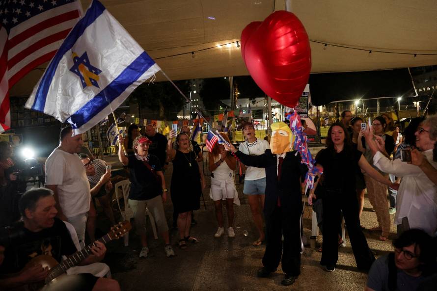 Reactions after Trump announced that Israel and Hamas agreed on the first phase of a Gaza ceasefire, in Tel Aviv