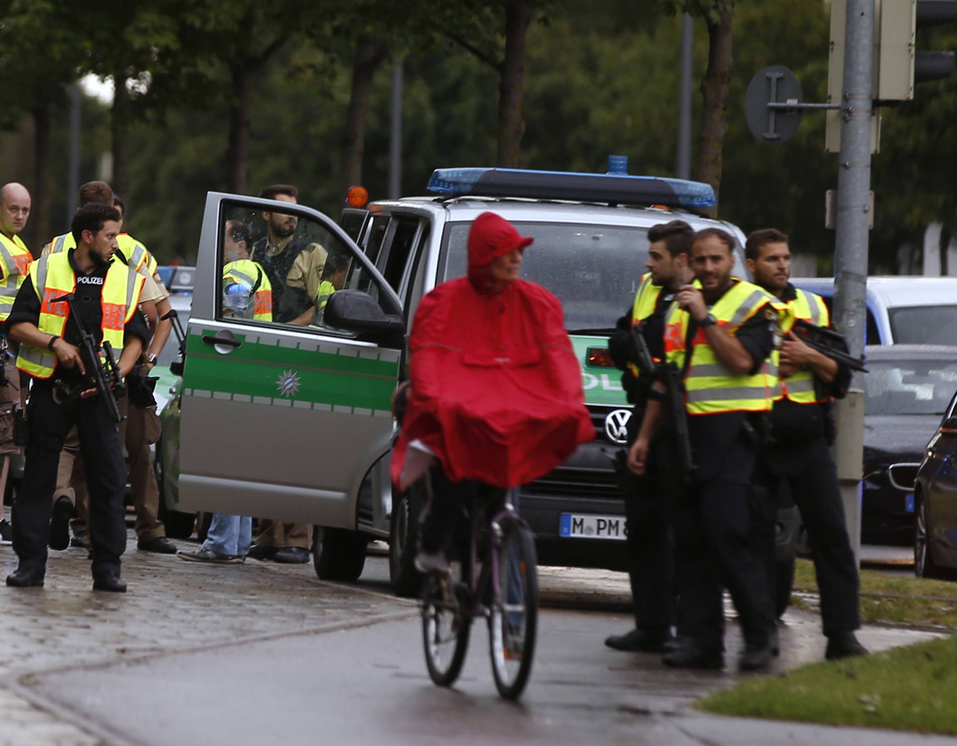 Police secure a street near to the scene of a shooting in Munich