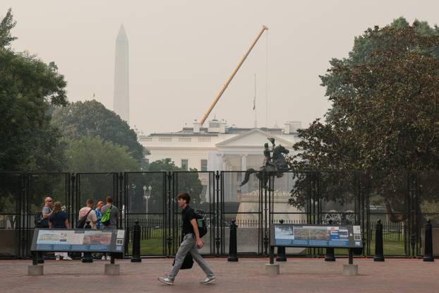 Smoke from Canadian wildfires clouds the White House and Washington Monument in Washington